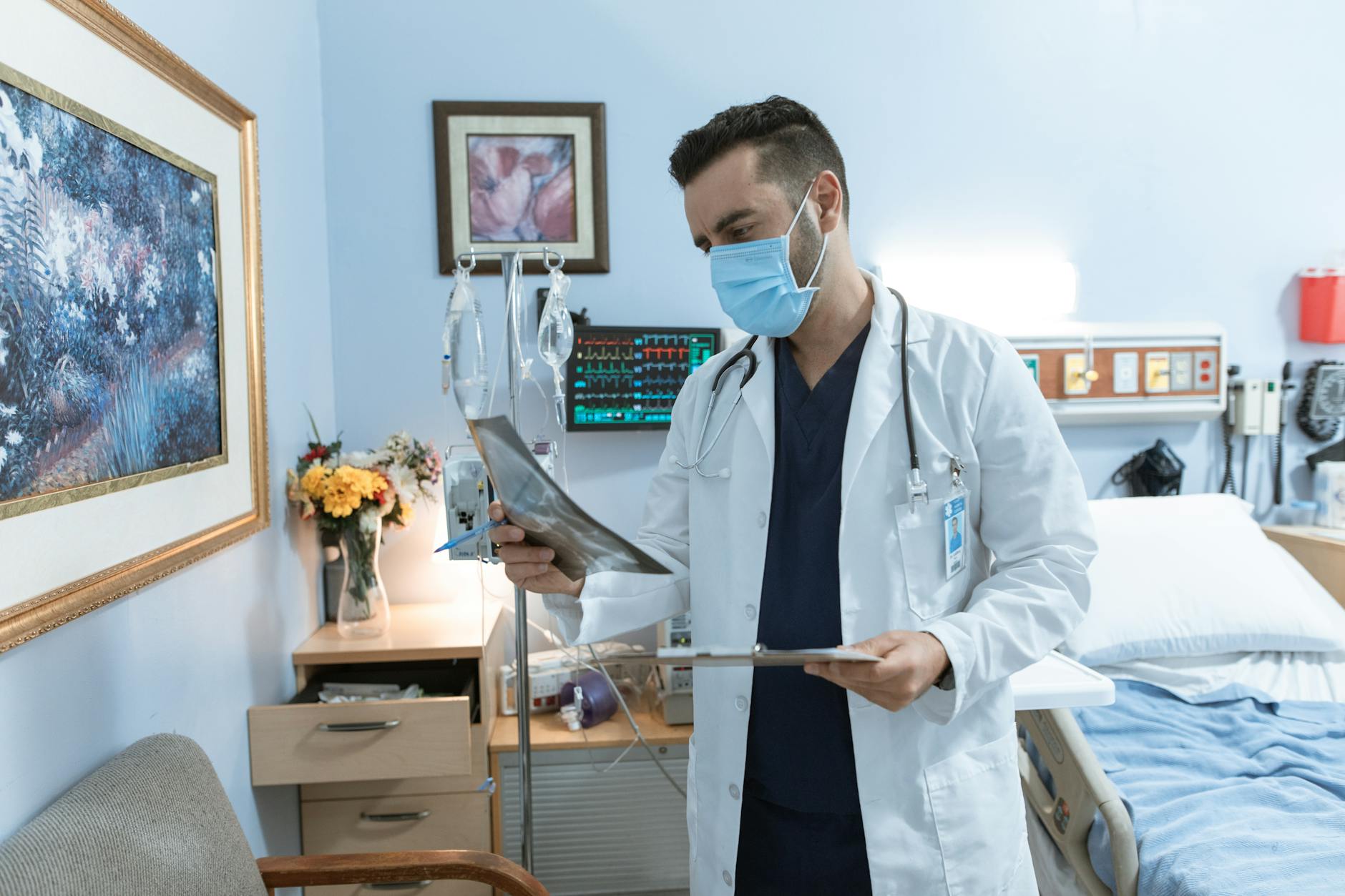 doctor checking a x ray film